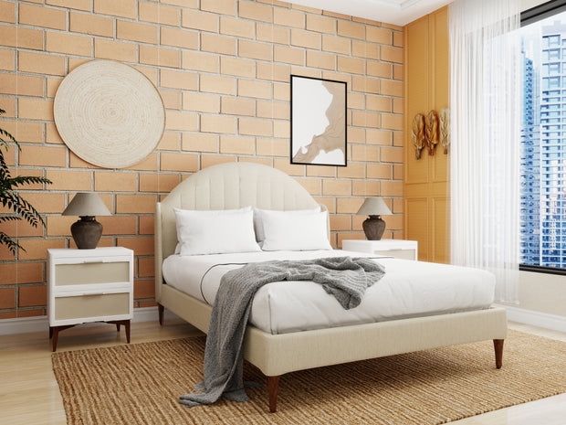 Havenwood off-white upholstered bed with arched headboard and wooden tapered legs in a modern bedroom.