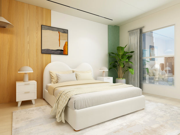 Beige upholstered bed with rounded headboard and wooden legs – Reverie frame.