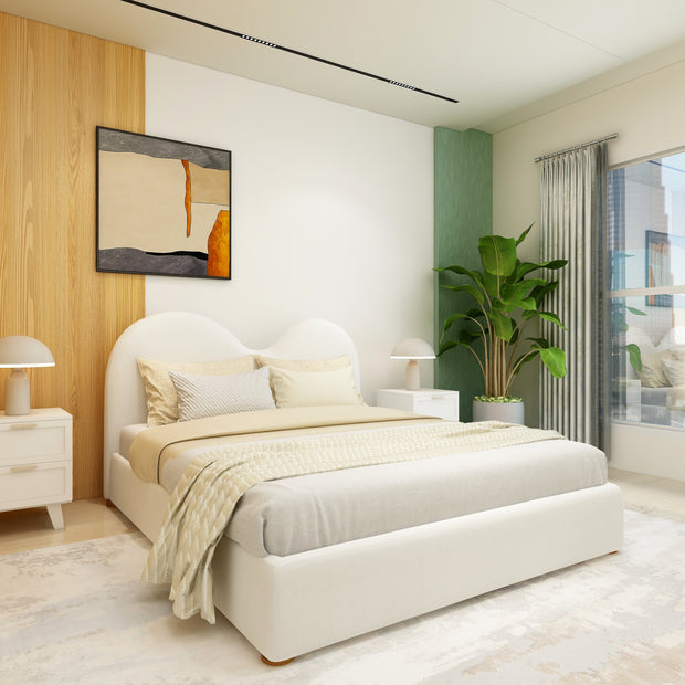 Beige upholstered bed with rounded headboard and wooden legs – Reverie frame.