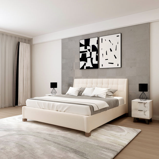 Botanica grey upholstered bed with padded rounded headboard and slatted base