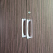 andle and soft-close hinge detail on wardrobe door
